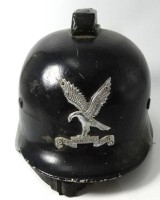 Auktion 346<br>Stahlhelm, Adler und Text "Falcks Redning Korps" dänische Sicherheits-und Rettungsgemeinschaft (seit 1906)