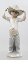 Auktion 373<br>Eine Jungen -Figur von Nao by Lladro Spain ,, little Cowboy ''