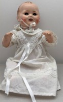 Auktion 373 / Los 12056 <br>Massekopf-Puppe mit Schelmenaugen, offener Mund, Mamastimme, Stoffk&ouml;rper, undeutl. gemarkt, H-42 cm