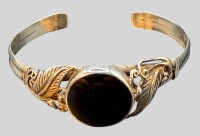 Auktion 373<br>Silber-Armspange-925- mit schwarzen Lagenstein (Onyx), 18,18 gr.