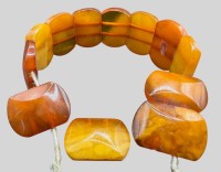 Auktion 373<br>Bernstein-Zugarmband, Gummi gerissen, ca. 18 gr