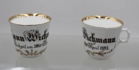 Auktion 373<br>Paar Hochzeitstassen,  beschriftet, datiert 1893, je H-8,5cm