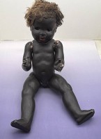 Auktion 373<br>grosse Farbigen-Massepuppe, bespielt, H-57 cm