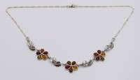 Auktion 374<br>925er Silbercollier, Bernsteinbesatz, floral gefasst, 11,6gr., L-44cm