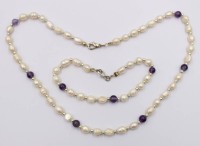 Auktion 374<br>SW-Perlenset. Kette und Armband, Amethystkugeln, ca. L48cm u. 20cm