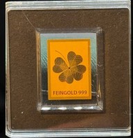 Auktion 374<br>Goldbarren Mauerfall Gl&uuml;cks - Kleeblatt 999/1000 Gold, 1/500 oz Bankfrisch in Acryl,