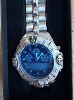 Auktion 374 / Los 2030 <br>Quartz Herren-Armbanduhr - Eric Chevillard - Digital -Analog, neu in OVP