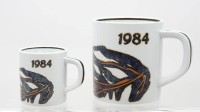 Auktion 374<br>Royal Copenhagen Jahresbecher ,1984, Entw. Ivan Weiss, gr. Becher mit 925er Silberplatte, ca. H-11,5 u. 7,5cm