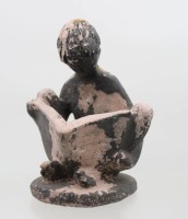 Auktion 374 / Los 15014 <br>"Boy Seated Reading a Book" Austin Productions, starke Altersspuren, ca. H-17cm