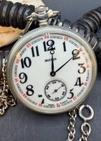 Auktion 374<br>mechan. Taschenuhr "Molnija" Russia, Werk l&auml;uft, mit Kette, neuwertig, verso W&ouml;lfe, D-5 cm
