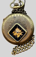 Auktion 374<br>mechan. HTU ion Metallgeh&auml;use mit Ausschnitt, Werk l&auml;uft, mit Kette, neuwertig, D-4,5 cm