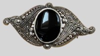 Auktion 374<br>Silber-925- Brosche mit Onyx und Markasiten, 5x2,5 cm, 10,19 gr.