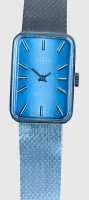 Auktion 374<br>mechan. DAU "Itraco" Swiss made, Silberfarben, Werk l&auml;uft, gepflegte Erhaltung, blaues Ziffernblatt ,verso orig. Schutzfolie