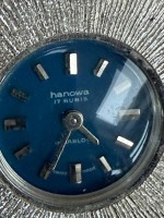 Auktion 374<br>mechan. DAU Hanowa" Swiss made, Silberfarben, Werk l&auml;uft, gepflegte Erhaltung, blaues Ziffernblatt