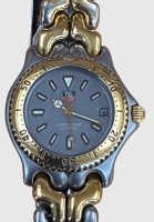 Auktion 374<br>TAG HEUER S95.206 Cell Professional mit orig. Stahl/Gold Band, Werk l&auml;uft, Batterie aber schon am Ende, guter Zustand