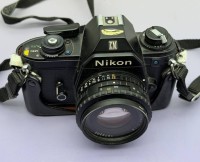 Auktion 374<br>Nikon EM Spiegelreflex in orig. Etui