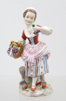 Auktion 375<br>Figur, Sitzendorf, G&auml;rtnerkind, bemalt, 2x kl. Chips an Bl&auml;ttern, ca. H-16,5cm