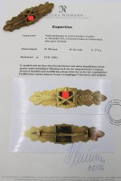 Auktion 375<br>Nahkampfspange in gold, Herst. C.E.Juncker Berlin, anbei Zertifikat "Detlev Niemann"