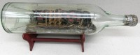 Auktion 375<br>altes Flaschenschiff vor Diorama, Kaiserflagge, L-35 cm