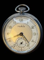 Auktion 375<br>mechan. Ruhla HTU in Metallgeh&auml;use, Werk l&auml;uft, Glas mit Sprung, D-5 cm