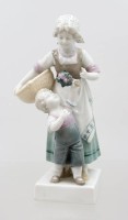 Auktion 375<br>Figurengruppe, Mutter mit Kind, W.-Goebel-Porzellanfabrik aus Oeslau, Unterglasurfarben, ca. H-16,5cm, 1x an Finger min. bestossen