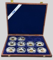 Auktion 376<br>10x grosse Medaillen "Das Geld Europas" in Holzkasten, alle boxed, D. je ca. 5,3 cm, Ni/Cu versilbert