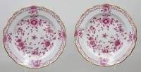 Auktion 376<br>2 x Mittelteller Meissen Indisch Purpur mit Goldrand und Zier .