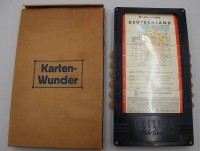 Auktion 376<br>historische Stra&szlig;enkarte von Deutschland (&bdquo;Karten-Wunder&ldquo;) mit einer Haltevorrichtung von Philips Auto Lampen aus der Zeit um 1940.