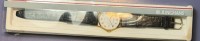 Auktion 376<br>Quartz DAU "Junghans" neu in Display, schwarzes Band