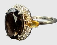 Auktion 376<br>Silberring-925- mit braunen Topas, umringt von klaren Steinen, RG 60, 5 gr