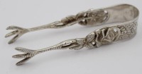 Auktion 376<br>Zucklerzange, 800er Silber, 15,4gr., ca. L-8cm