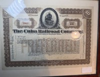 Auktion 376 / Los 6059 <br>Aktie "The Cuba Railroad Company" 1920, ger/Glas, RG 28x35 cm