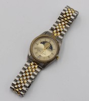 Auktion 376<br>Bicolor-Armbanduhr, Continental Quarzwerk, Mondphasenanzeige und Datumsfenster, Werk l&auml;uft, D-3cm
