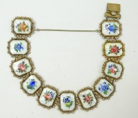 Los 5002 <br>925er-Silberarmband, emailliert mit Blütendekor, L. ca. 21 cm, B. 2,2 cm, 38 gr.