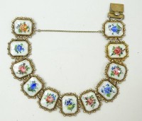 Los 5002 <br>925er-Silberarmband, emailliert mit Bl&uuml;tendekor, L. ca. 21 cm, B. 2,2 cm, 38 gr.