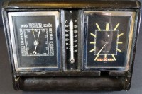 Los 6023 <br>Tischuhr mit Wetterstation, Aufzugwerk steht, H-12 cm, B-16 cm