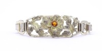 Los 5044 <br>Altes Silber Armband mit einen rund facc. Edelstein, Band Silber 0.800, mittig Fassung Silber 0.935 ,L. 16,5cm, leicht vergoldet, 12,3g.