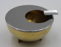 Los 10015 <br>Ascher, Edelstahl, Bauhaus - Entwurf 1924 von MARIANNE BRANDT (1893-1983), Ausführung Alessi, H-7,7cm D-11cm.