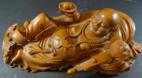 Auktion  / Los 15563 <br>liegender Buddha, Holzschnitzerei, China, H-13 cm, L-38 cm