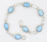 Los  <br>Armband, 925er-Silber, mit hellblauen Cabochons, L. 17 cm, 7 gr.