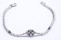 Los  <br>Armband mit rund facc. Saphiren, Silber 0.835 L. 19cm, 8,8g.