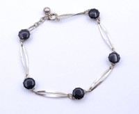 Los  <br>800er Silber Armband mit Onyx, L. 17-18,5cm, 4,2g.