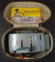 Auktion 338 / Los 16056 <br>manuelle Frankiermaschine "TN" Postalia mit Beschreibung in Hülle, H-13 cm, 18x11 cm