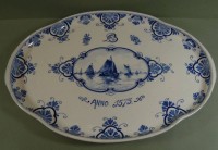 Auktion 344 / Los 9015 <br>ovale Delftplatte nach antiken Vorbild, Blaumalerei, 35x25 cm