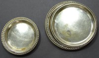 5 Silberteller/-untersetzer, 830-925/000, Ø 9,7-14 cm, zus. 360 gr., mit Kratzern und leichten Verschmutzungen