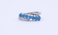 Auktion 331 / Los 1008 <br>Silber Ring mit rund facc. blauen Steinen, 0.925, 2,5g., RG 50