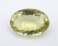 Auktion 332 / Los 1010 <br>Lemon Citrin, Ovalschliff, 132,15 ct, hohe Reinheit und Brillanz, 4 x 2,9 x 1,8 cm