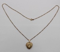 Auktion 332 / Los 1013 <br>375er GG Medaillon an 8ct. Kette, zus. 8,3gr., Medaillon ca. 3cm, Kette L-52cm.