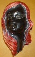 Auktion 332 / Los 15010 <br>"Jema"  Keramik  Wandmaske, junge schwarze Frau, Holland, 24x14 cm, sehr gut erhalten