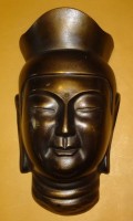 Auktion 332 / Los 15500 <br>Bronze-Maske "Nippon Travel Agency", 24x14 cm, 1,3 kg